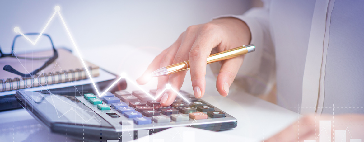 accountant calculating profit with financial analysis graphs